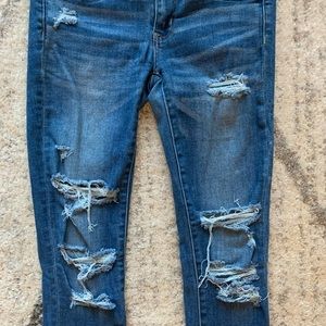 American Eagle - Distressed super super stretch jegging. Size 4